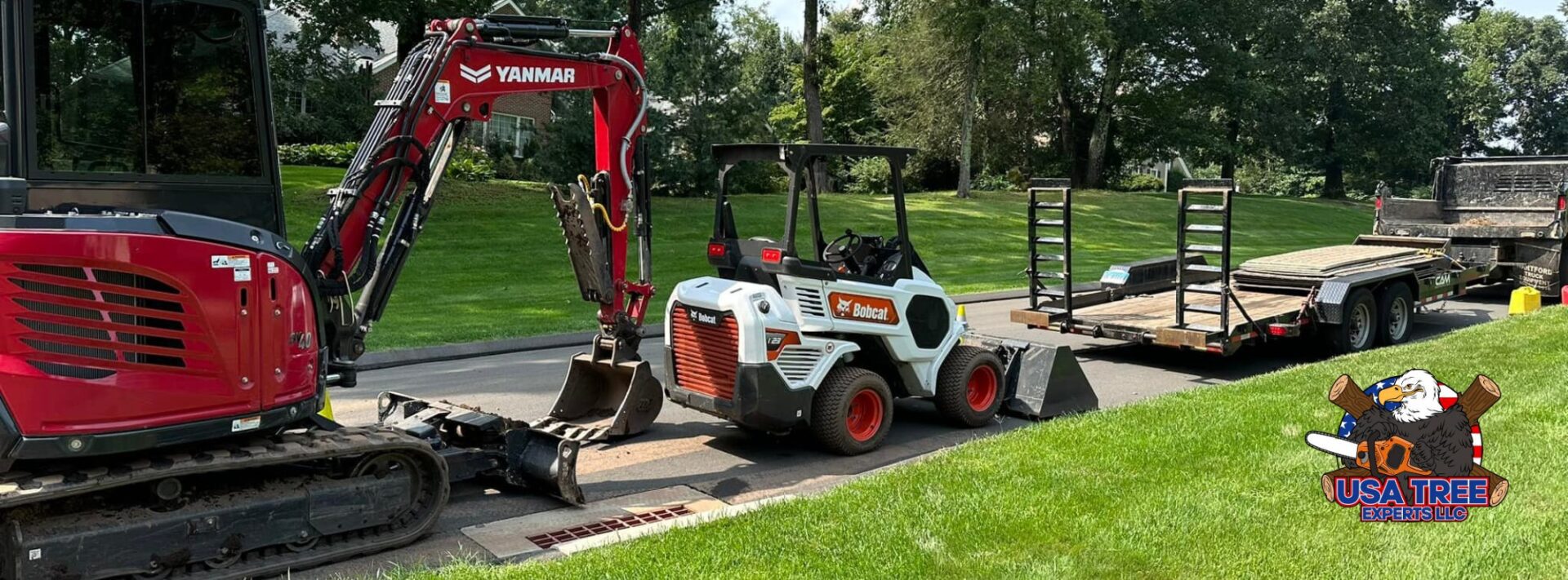 usda tree blog header USA Tree Experts equipment lineup featuring Yanmar excavator, Bobcat loader, and trailer ready for land clearing and tree removal services in Connecticut